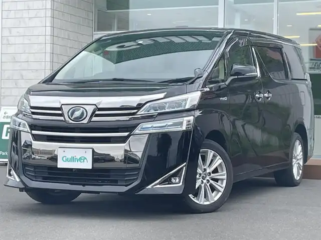 トヨタ ヴェルファイア ハイブリット X 道央・札幌 2018(平30)年 6.6万km ブラック ・４WD/・衝突軽減ブレーキ/・寒冷地仕様/・両側パワースライドドア/・サンルーフ/・純正ナビ/　CD＆DVD＆BT＆TV/・バックカメラ/・フリップダウンモニター/・コーナーセンサー/・レーンキープアシスト/・レーダークルーズコントロール/・AC１００V /・ワイパー熱線/・オートエアコン/・オートライト/・オートリトラミラー/・ステアリングスイッチ/・ハンズフリー/・プッシュスタート/・スマートキー/・リアヒッチメンバー/・ビルトインETC/・LEDヘッドライト/・MT付きAT/・純正フロアマット/・ドアバイザー/・ウィンカーミラー/・フォグライト/・スペアキー