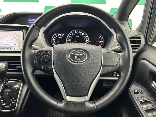 トヨタ ヴォクシー ZS 鹿児島県 2014(平26)年 7.5万km ブラッキッシュアゲハガラスフレーク ワンオーナー/片側パワースライドドア/アイドリングストップ/純正7インチSDナビ【NSCP-W62】/（CD/DVD/ワンセグ/Bluetooth/SD）/ビルトインETC/バックカメラ/革巻きステアリング/ステアリングリモコン/純正LEDヘッドライト/フロントフォグランプ/オートライト/スペアタイヤ1本/純正フロアマット/純正ドアバイザー/純正16インチアルミ/保証書&取扱説明書
