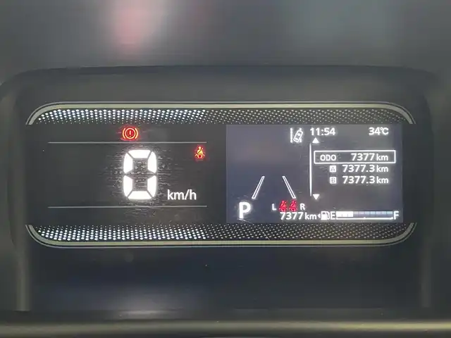 スズキ スペーシア HYBRID X 滋賀県 2024(令6)年 0.8万km モスグレーメタリック 純正9インチナビ/【CD.DVD.Bluetooth.フルセグTV】/全方位カメラ/衝突軽減ブレーキ/前席シートヒーター/両側パワースライドドア/レザー調シートカバー/コーナーセンサー/LEDヘッドライト/オートライト/アイドリングストップ/オットマン/スマートキー