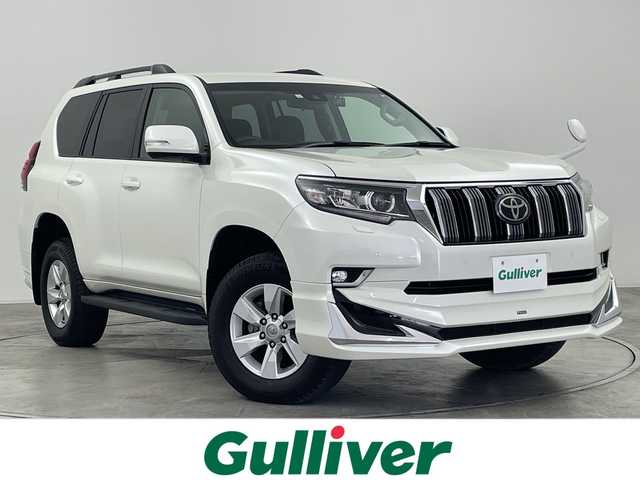 トヨタ ランドクルーザー プラド TX 群馬県 2023(令5)年 1.7万km ホワイトパールクリスタルシャイン 純正９インチナビ/・フルセグTV/AM/FM/Bluetooth/Miracast/Apple Carplay/AndroidAuto/純正９インチナビ　ブラックルーフレール　モデリスタエアロ　アダプティブクルーズコントロール　衝突被害軽減　横滑り防止　バックカメラ　レーンキープアシスト　ＥＴＣ　ダウンヒルアシストコントロール　禁煙車