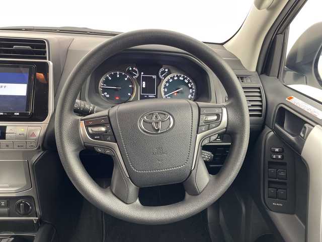 トヨタ ランドクルーザー プラド TX 群馬県 2023(令5)年 1.7万km ホワイトパールクリスタルシャイン 純正９インチナビ/・フルセグTV/AM/FM/Bluetooth/Miracast/Apple Carplay/AndroidAuto/純正９インチナビ　ブラックルーフレール　モデリスタエアロ　アダプティブクルーズコントロール　衝突被害軽減　横滑り防止　バックカメラ　レーンキープアシスト　ＥＴＣ　ダウンヒルアシストコントロール　禁煙車