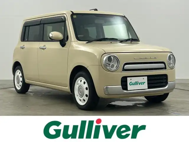 スズキ ラパン X 岡山県 2013(平25)年 7.4万km ミルクティーベージュメタリック メモリーナビ/【Bluetooth/フルセグTV/CD/DVD】/型番:CN-RE05D/スマートキー/プッシュスタート/ビルトインＥＴＣ/キセノンヘッドライト/オートライト/アイドリングストップ/ショコラ専用シート/純正フロアマット/禁煙車/横滑り防止装置/ドアバイザー/取扱説明書/ナビ取扱説明書