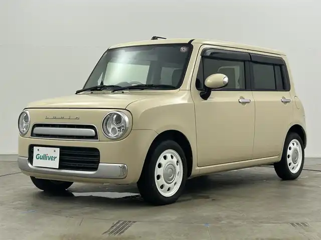 スズキ ラパン X 岡山県 2013(平25)年 7.4万km ミルクティーベージュメタリック メモリーナビ/【Bluetooth/フルセグTV/CD/DVD】/型番:CN-RE05D/スマートキー/プッシュスタート/ビルトインＥＴＣ/キセノンヘッドライト/オートライト/アイドリングストップ/ショコラ専用シート/純正フロアマット/禁煙車/横滑り防止装置/ドアバイザー/取扱説明書/ナビ取扱説明書