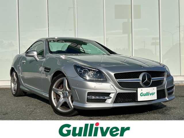 メルセデス・ベンツ ＳＬＫ２００ 福岡県 2014(平26)年 7.5万km シルバー ガラスルーフ/純正ナビ（フルセグテレビ/Bluetooth/CD）/クルーズコントロール/LEDヘッドライト/オートライト/革シート/シートヒーター/パワーシート/純正18インチアルミホイール/ステアリングスイッチ/USBポート/横滑り防止装置/盗難防止装置/コーナーセンサー/スマートキー/ETC/ドライブレコーダー（前方のみ）/保証書/取扱説明書