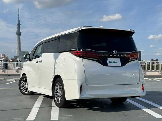 トヨタ アルファード Z 東京都 2024(令6)年 0.6万km プラチナホワイトパールマイカ ワンオーナー/Toyota Safety Sense/・プリクラッシュセーフティ（歩行者［昼夜］・自転車運転者［昼］・自動二輪車［昼］検知機能付衝突回避支援タイプ/ミリ波レーダー＋単眼カメラ方式)/・レーントレーシングアシスト［LTA］+レーンディパーチャーアラート［LDA］/・レーダークルーズコントロール(全車速追従機能付)/・アダプティブハイビームシステム［AHS］/・ロードサインアシスト［RSA］/・ドライバー異常時対応システム/・プロアクティブドライビングアシスト［PDA］/・発信遅れ告知機能/・ブラインドスポットモニター［BSM］+安心降車アシスト(ドアオープン制御付)［SEA］+後方車両接近告知+周辺車両接近時サポート(通報提案機能)+後方車両への接近警報+セカンダリーコリジョンブレーキ(停車中後突対応)/パーキングブレーキサポート/パノラミックビューモニター/14インチHDディスプレイナビゲーションシステム/・地デジ(12セグ/ワンセグ)/・Bluetooth/・Apple CarPlay/Android Auto/・USB/快適温熱シート+ベンチレーションシート/保証書・取説・スペアキー１本