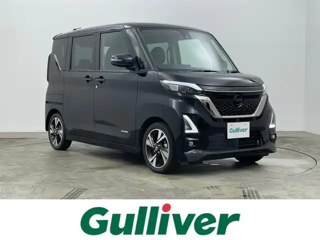 日産 ルークス HWS Gターボ アーバンクロム プロパイロットED 岡山県 2022(令4)年 2.7万km ブラック 純正7インチSDナビ(MJ118D-L)/【CD/BT/フルセグTV】/プロパイロット/ブラック革調シート/衝突軽減ブレーキ/両側パワースライドドア/アラウンドビューモニター/LEDヘッドライト/コーナーセンサー/オートハイビーム/プッシュスタート/スマートキー/アイドリングストップ/レーンキープアシスト/純正フロアマット/純正アルミホイール/ウインカーミラー/LEDフォグランプ/新車保証書/取扱説明書
