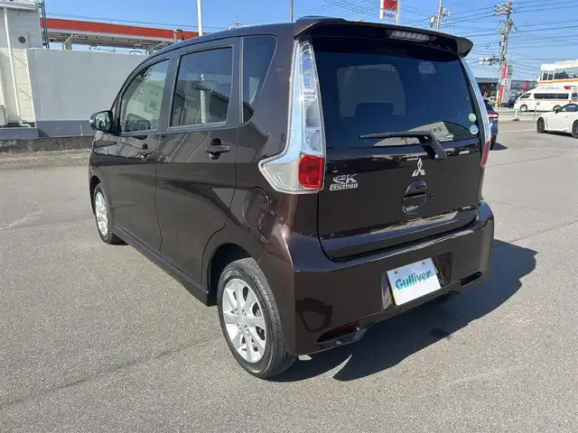 三菱 ｅＫカスタム G 岡山県 2015(平27)年 6.6万km ショコラブラウンP 登録時走行距離65634km/社外ナビ/（AM/FM/CD/DVD/BT）/全方位カメラ/アイドリングストップ/電格ミラー/オートエアコン/プッシュスタート/スマートキー/純正14インチアルミホイール