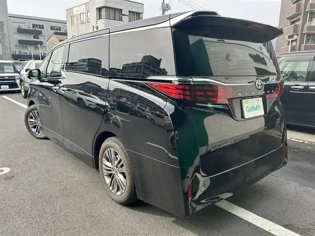 トヨタ アルファード Z 島根県 2024(令6)年 0.4万km ブラック 走行3795km/純正14型ナビ/フルセグTV/スマートフォン連携OS機能/全方位/バック/フロントカメラ　/リアエンターテイメント /純正ビルトインETC2.0 /両側パワースライドドア/パワーバックドア /全席シートヒーター /前席/2列目パワーシート /2列目オットマン/レーダークルコン /ヘッドアップディスプレイ/ブラインドスポットモニター/コーナーセンサー/オートハイビーム/ハンドルヒーター/黒レザーシート(本革)/LEDヘッドライト/レーンアシスト/衝突軽減ブレーキ/純正フロアマット/ドアバイザー/保証書・取説・スペアキー1本