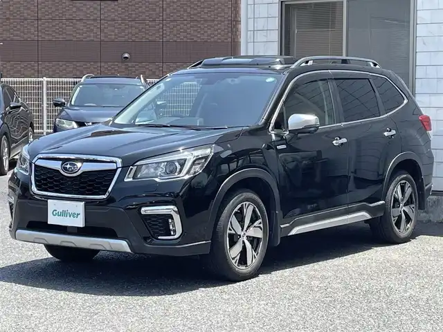 スバル フォレスター ハイブリッド アドバンス 福岡県 2020(令2)年 4.5万km クリスタルブラックシリカ ワンオーナー/STIエアロ（フロント・サイド・リア）/サンルーフ/純正8インチメモリナビ【CN-LR840DFD】/（AM/FM/CD/DVD/Bluetooth/iPod/USB/フルセグTV）/アイサイト/・後側方警戒支援/・誤後進抑制制御/・横滑り防止機能/・車線逸脱防止装置/・後退時ブレーキアシスト/・オートビークルホールド/・プリクラッシュブレーキ/・全車速追従機能付クルーズコントロール/・定速クルーズコントロール/・先行車発進装置/クリアランスソナー/コナーセンサー/盗難防止装置/パワーバックドア/メモリーハイト機能/純正18インチアルミホイール/茶色レザーシート/スマートリアビューミラー/ステアリングヒーター/シートヒーター（全席）/プッシュスタート/パドルシフト/ECOモード/フロント/サイドカメラ/ビルトインETC/nanoe付エアコン/純正前後ドライブレコーダー【DR-6980】/ISOFIX/電格ウィンカーミラー/ドアバイザー/純正ラバー　フロアマット/2.1A電源ソケット×2/USB端子×1/スペアキー×1/保証書/取扱説明書/ナビ取扱説明書/ドライブレコーダー取扱説明書