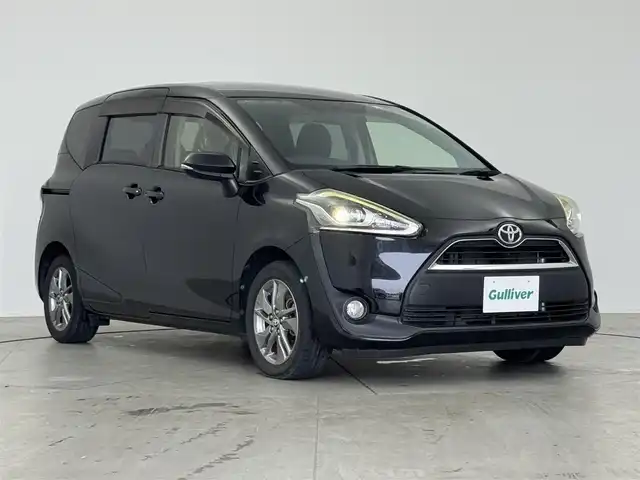 トヨタ シエンタ G 愛知県 2016(平28)年 3.1万km ブラックマイカ 純正７インチＳＤナビ　/(BT/CD/DVD/フルセグTV）/バックカメラ　/ＥＴＣ　/純正１５インチＡＷ/ドアバイザー　/純正ＬＥＤヘッドライト　/両側パワスラ　　/アイドリングストップ/フロアマット　/オートライト　/横滑り防止装置　/スマートキー/スペアキー