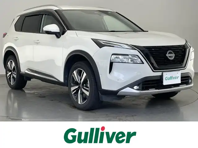 日産 エクストレイル G e－4ORCE 愛知県 2023(令5)年 5.1万km ブリリアントホワイトパール 純正ナビ　デジイン　ＨＵＤ　ＢＳＭ　全方位カメラ　プロパイロット　メモリーシート　追従クルコン　フルセグTV　ＵＳＢ　ワイヤレス充電　衝突軽減　シートヒーター前席&後席　ステアリングヒーター　パーキングアシスト　LEDライト　禁煙車　AC１００充電　２．０ETC　フォグ　合皮シート　セカンド席サンシェード　