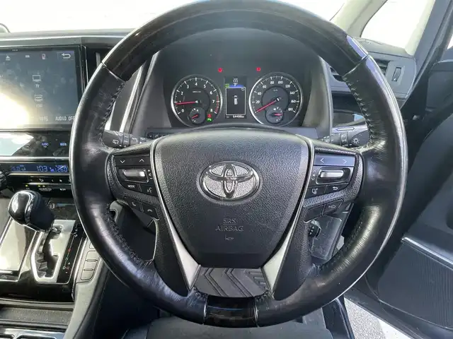 トヨタ ヴェルファイア Z Gエディション 福岡県 2017(平29)年 6.5万km ブラック 純正10型SDナビ(フルセグTV/CD/DVD/BT/HDMI)/モデリスタエアロ(F.S.R)/バックカメラ/後席フリップダウンモニター/プリクラッシュセーフティー/コーナーセンサー/電動リアゲート/両側パワスラ/レーダークルコン/ハンドルヒーター/ドラレコ/ETC/オートホールド/100V/USBポート/純正LEDヘッドライト/純正フロアマット/純正18インチアルミホイール/プッシュスタート/スマートキー