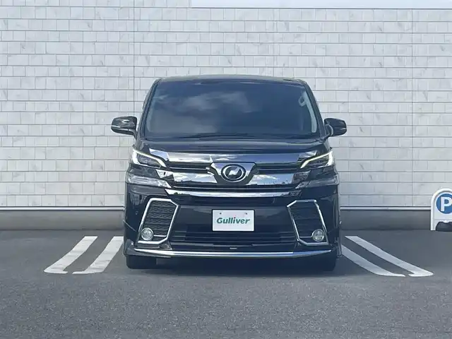 トヨタ ヴェルファイア Z Gエディション 福岡県 2017(平29)年 6.5万km ブラック 純正10型SDナビ(フルセグTV/CD/DVD/BT/HDMI)/モデリスタエアロ(F.S.R)/バックカメラ/後席フリップダウンモニター/プリクラッシュセーフティー/コーナーセンサー/電動リアゲート/両側パワスラ/レーダークルコン/ハンドルヒーター/ドラレコ/ETC/オートホールド/100V/USBポート/純正LEDヘッドライト/純正フロアマット/純正18インチアルミホイール/プッシュスタート/スマートキー