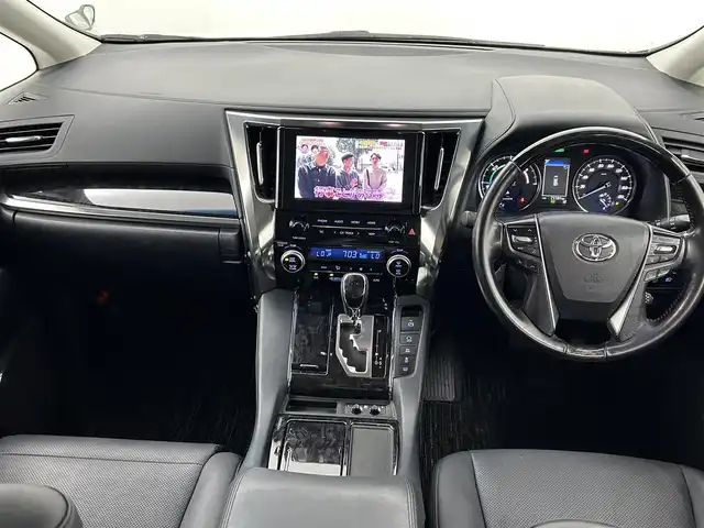 トヨタ ヴェルファイア ハイブリット ZR 熊本県 2021(令3)年 7.2万km ホワイトパールクリスタルシャイン ワンオーナー/純正ナビ（走行中視聴可能）/CD/DVDデッキ/純正フリップダウンモニター/ビルトインETC/レザーシート/前席シートヒーター/シートベンチレーション/パワーバックドア/社外前後ドライブレコーダー/トヨタセーフティセンス/・プリクラッシュセーフティ/・レーントレーシングアシスト/・レーダークルーズコントロール/・オートマチックハイビーム/・ロードサインアシスト/・パーキングサポートブレーキ/純正１７インチアルミホイール/保証書/取扱説明書