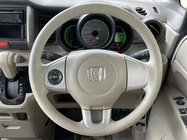 ホンダ Ｎ ＢＯＸ G Lパッケージ 青森県 2012(平24)年 9.6万km クリスタルブラックパール フルフラットシート/片側パワースライド/社外CDオーディオ/横滑り防止機能/アイドリングストップ/盗難防止機能/パワーステアリング/ステアリングスイッチ/ベンチシート/センターコンソール/電格ミラー/ドアバイザー/保証書/取扱説明書