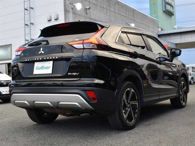 三菱 エクリプス クロス ＰＨＥＶ G 福岡県 2022(令4)年 6.2万km アメジストブラック e-Assist/MI-PILOT/クルーズコントロール/BSM/ヘッドアップディスプレイ/ドライブモードセレクト/EVスイッチ/ブレーキオートホールド/電動パーキングブレーキ/社外ナビ(AVN-LS02W)/フルセグTV/バックカメラ/社外ドライブレコーダー(CSD-570FH)/ステアリングヒーター/パドルシフト/ステアリングスイッチ/ハーフレザーシート/前席シートヒーター/運転席パワーシート/ETC/純正18インチアルミホイール/LEDヘッドライト/フォグランプ/ドアバイザー/フロアマット/プッシュスタート/スマートキー