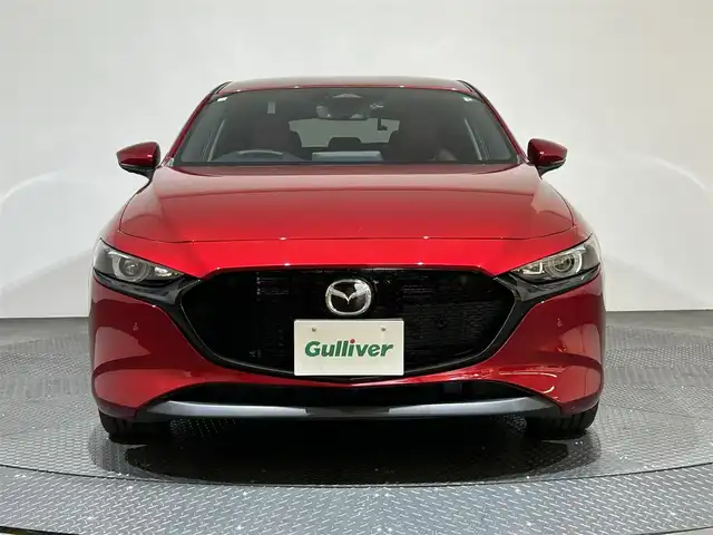 マツダ マツダ３ファストバック XD プロアクティブ ツーリングS 愛媛県 2023(令5)年 2.7万km ソウルレッドクリスタルM １０．２５型ナビ/（フルセグＴＶ・ＢＴ・ａｐｐｌｅｃａｒｐｌａｙ・ＦＭ・ＡＭ・ＵＳＢ）/・全方位カメラ　/・前後ドラレコ　/・ＥＴＣ　/・衝突軽減ブレーキ　/・レーンキープアシスト　/・レーダークルーズコントロール/・オートマチックハイビーム/・D席パワーシート/・DN席シートヒーター/・ステアリングヒーター/・前後コーナーセンサー/・シートメモリー/・置くだけ充電/・スペアキー