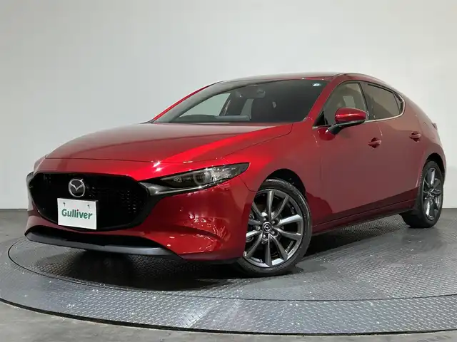 マツダ マツダ３ファストバック XD プロアクティブ ツーリングS 愛媛県 2023(令5)年 2.7万km ソウルレッドクリスタルM １０．２５型ナビ/（フルセグＴＶ・ＢＴ・ａｐｐｌｅｃａｒｐｌａｙ・ＦＭ・ＡＭ・ＵＳＢ）/・全方位カメラ　/・前後ドラレコ　/・ＥＴＣ　/・衝突軽減ブレーキ　/・レーンキープアシスト　/・レーダークルーズコントロール/・オートマチックハイビーム/・D席パワーシート/・DN席シートヒーター/・ステアリングヒーター/・前後コーナーセンサー/・シートメモリー/・置くだけ充電/・スペアキー