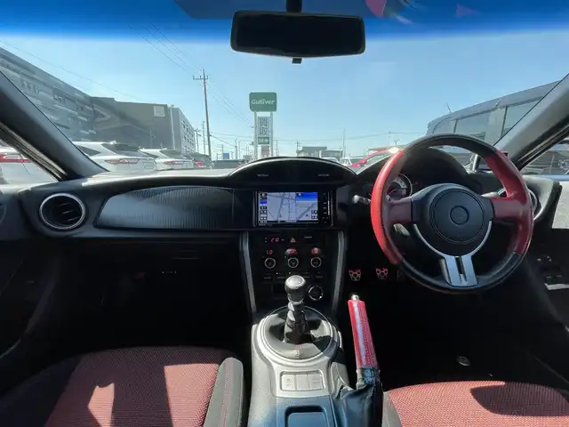 トヨタ ８６ GT 千葉県 2012(平24)年 8.8万km クリスタルブラックシリカ 6MT/モデリスタエアロ/HKS車高調/HKS２本出しマフラー/SSR１８インチアルミホイール/HKSエアクリーナー/クスコタワーバー/社外SDナビ【CN-RE07WD】/・CD/DVD/MSV/Bluetooth/フルセグ/バックカメラ/スマートキー/社外ETC/純正キセノンヘッドライト/フォグランプ/カーテンエアバッグ/新車時保証書＆取扱説明書
