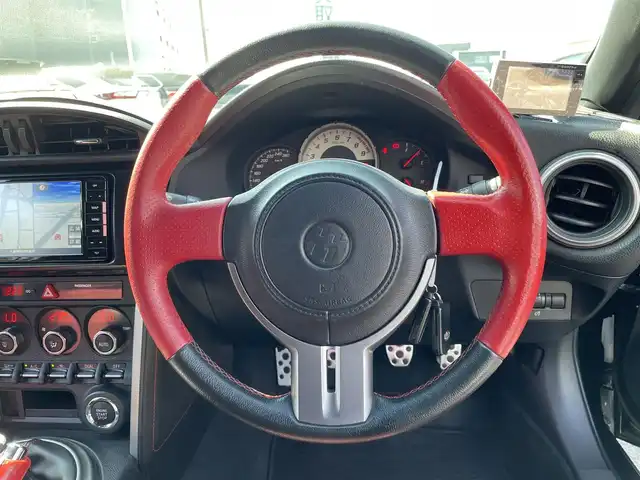 トヨタ ８６ GT 千葉県 2012(平24)年 8.8万km クリスタルブラックシリカ 6MT/モデリスタエアロ/HKS車高調/HKS２本出しマフラー/SSR１８インチアルミホイール/HKSエアクリーナー/クスコタワーバー/社外SDナビ【CN-RE07WD】/・CD/DVD/MSV/Bluetooth/フルセグ/バックカメラ/スマートキー/社外ETC/純正キセノンヘッドライト/フォグランプ/カーテンエアバッグ/新車時保証書＆取扱説明書