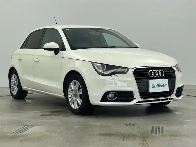 アウディ Ａ１ スポーツバック 1．4TFSI 岡山県 2013(平25)年 4.7万km 白 純正ナビ/（CD/TV/BT)/プッシュスタート/社外前後ドライブレコーダー/オートライト/ETC/ステアリングリモコン/純正フロアマット/アイドリングストップ