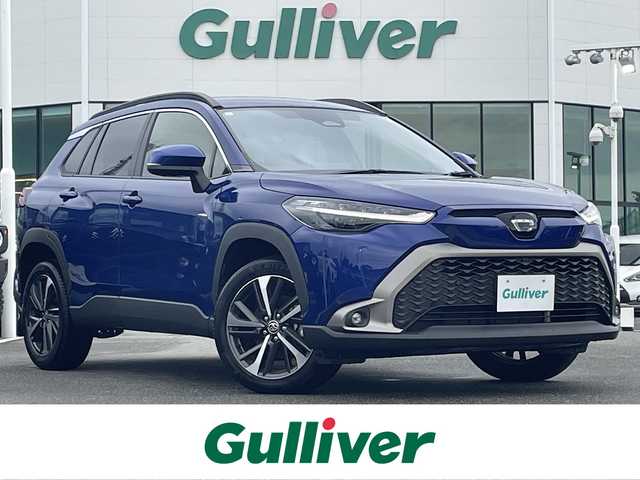 トヨタ カローラ クロス ハイブリッド Z 佐賀県 2024(令6)年 1.1万km ダークブルーマイカM 純正10.5インチディスプレイオーディオ(ナビ機能・前後ドライブレコーダー機能付)/・フルセグTV/AM/FM/USB/Bluetooth/パノラミックビューモニター/ビルトインETC2.0/アドバンストパーク/パワーバックドア(予約ロック機能付)/電子パーキングブレーキ/・AUTO HOLD機能/ハーフレザーシート/D席パワーシート/DN席シートヒーター/ISOFIX対応/革巻きステアリング/ステアリングリモコン/純正18インチアルミホイール/純正LEDヘッドライト/・オートマチックハイビーム/純正LEDフォグランプ/純正フロアマット/取扱説明書/トヨタセーフティセンス/・レーダークルーズコントロール/・レーンディパーチャーアラート/・ブラインドスポットモニター/・プリクラッシュセーフティ/・プロアクティブドライビングアシスト/・リヤクロストラフィックアラート/・リヤカメラディテクション/・パーキングサポートブレーキ/・安心降車アシスト/・ロードサインアシスト