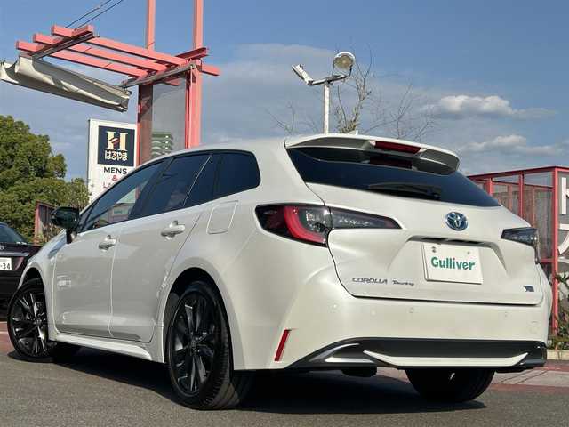 トヨタ カローラツーリング ハイブリッド ダブルバイビー 香川県 2023(令5)年 3.1万km プラチナホワイトパールマイカ 純正SDナビ/【Bluetooth/フルセグ】/ヘッドアップディスプレイ/ハンドルヒーター/電子パーキング/バックカメラ/ハーフレザーシート/純正17インチアルミ/スマートキー/LEDヘッドライト/純正ETC/純正フロアマット/パワーステアリング/パワーウィンドウ