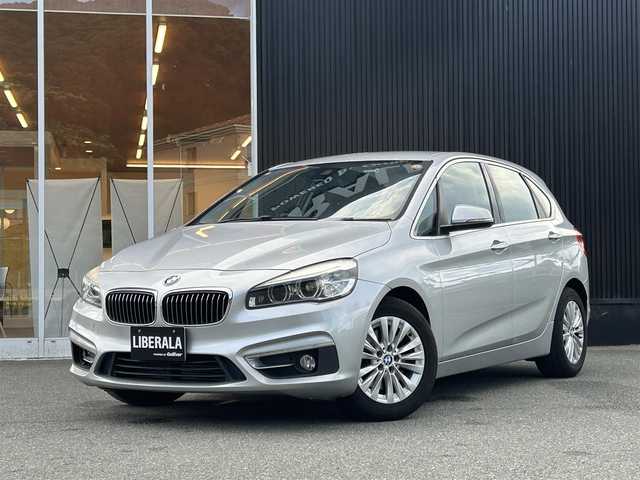 ＢＭＷ ２１８ｉ アクティブツアラー ラグジュアリー 福岡県 2015(平27)年 5.9万km カシミヤシルバー インテリジェントセーフティ/黒革シート/前席シートヒーター/純正ナビ　/Bluetooth/バックカメラ/HIDライト/オートライト/フロントフォグランプ/リアフォグランプ/オートワイパー/ステアリングスイッチ/ドライブレコーダー/純正16インチアルミホイール/ミラー一体型ＥＴＣ