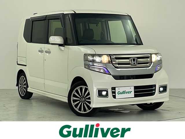 ホンダ Ｎ ＢＯＸ カスタム G ターボ Lパッケージ 大阪府 2016(平28)年 6.9万km プレミアムホワイトパールⅡ 社外SDナビ/　（Bluetooth/CD）/ワンセグTV/バックカメラ/クルーズコントロール/両側パワースライドドア/キセノンヘッドライト/フォグランプ/オートマチックハイビーム/ハーフレザーシート/純正15インチアルミホイール/パドルシフト/スマートキー/ETC