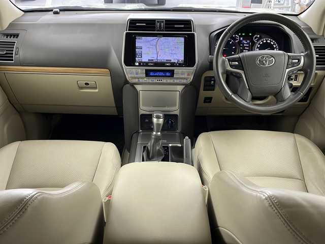 トヨタ ランドクルーザー プラド TX Lパッケージ 兵庫県 2019(平31)年 5万km ホワイトパールクリスタルシャイン ・社外9インチナビ/Bluetooth/CD/DVD/TV/・バックカメラ/・トヨタセーフティセンス/・プリクラッシュセーフティ/・レーンディパーチャーアラート/・オートマチックハイビーム/・レーダークルーズコントロール/・クリアランスソナー/・センターデフロック/・ダウンヒルアシストコントロール/・ローダウン/・オートサイドステップ/・革シート/・前席パワーシート/・前席シートヒーター/・前席ベンチレーション/・モデリスタエアロ/・22インチアルミホイールタイヤ/・LEDヘッドライト/・フォグランプ/・ビルトインETC/・スマートキー