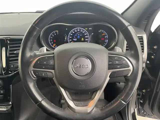 クライスラー・ジープ ジープ グランドチェロキー アルティテュード 富山県 2019(令1)年 7.5万km 黒Ｍ ４WD/純正ナビ（ｂｌｕｅｔｏｏｔｈ）/フルセグTV/バックカメラ　/前後コーナーセンサー/ＥＴＣ　/純正前後ドラレコ　/エアサス/リアパークセンスブレーキアシスト　/ハーフレザーシート　/前席パワーシート・シートヒーター　/社外１８インチＡＷ付スタッドレスセット積込（2024年７部山）/SPORTモード/スマートキー/プッシュスタート/オートライト/HIDヘッドライト/フォグ/クルーズコントロール/パドルシフト/純正マット/保証書、取説