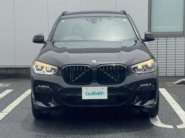 ＢＭＷ Ｘ３ ミッドナイトエディション 三重県 2020(令2)年 3.1万km サファイアブラックP 130台限定車/革シート/シートヒーター(前席)/電動ランバーサポート/パワーシート(前席)/メモリアル機能(運転席)/ワイヤレス充電器/ドライブレコーダー(前後)/パワーバックドア/全方位カメラ/harmankardonサラウンド(16スピーカー)/純正ナビ(Bluetooth/DTV/AM/FM/AppleCarPlay/音楽ライブラリ/Spotify/ScreenMirroring)/ドライビングアシストプラス/アクティブクルーズコントロール/ステアリング/レーンコントロールアシスト/レーンディパーチャーウォーニング/レーンチェンジウォーニング/アクティブサイドコリジョンプロテクション/前車接近警告/衝突回避/被害軽減ブレーキ/事故回避アシスト/後車衝突警告/クロストラフィックウォーニング/パーキングアシストプラス/パークディスタンスコントロール/パーキングアシスト/ミラー内蔵ETC2.0/ブラックフロントグリル/カーボンドアミラー/ブラッククロームデュアルマフラー/20インチブラック塗装AW/ブラックルーフレール/ピアノブラックインパネ加飾/合皮貼ダッシュボード/オートホールド/パドルシフト/Mシートベルト/スペアキー