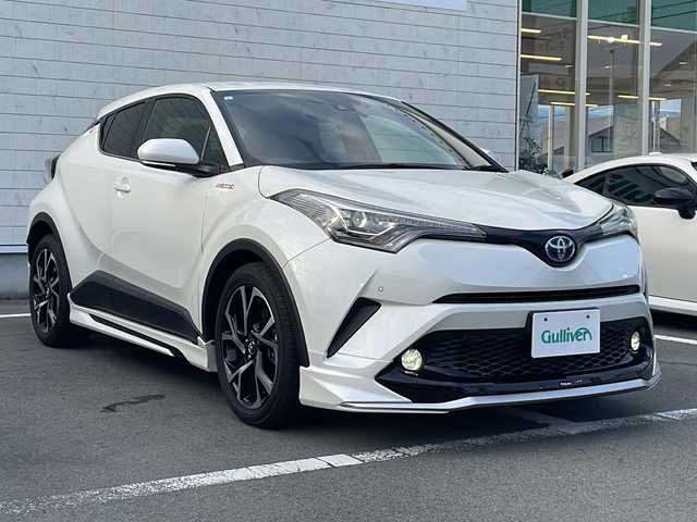 トヨタ Ｃ－ＨＲ G 静岡県 2017(平29)年 5.8万km ホワイトパールクリスタルシャイン 純正ナビ/地デジTV/純正CD/DVD/Bluetooth/バックカメラ/モデリスタエアロ/セーフティセンス/レーダークルーズコントロール/オートハイビーム/レーンキープアシスト/LEDヘッドライト/純正18インチAW/2.0ETC/スマートキー