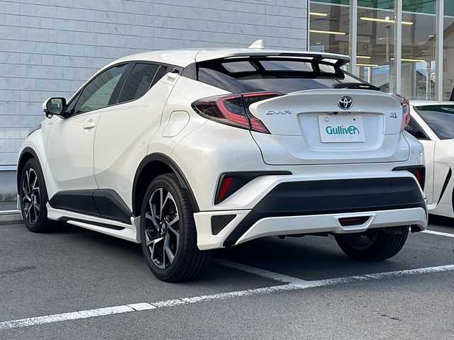 トヨタ Ｃ－ＨＲ G 静岡県 2017(平29)年 5.8万km ホワイトパールクリスタルシャイン 純正ナビ/地デジTV/純正CD/DVD/Bluetooth/バックカメラ/モデリスタエアロ/セーフティセンス/レーダークルーズコントロール/オートハイビーム/レーンキープアシスト/LEDヘッドライト/純正18インチAW/2.0ETC/スマートキー