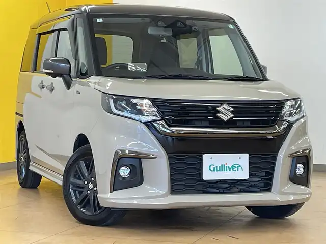スズキ ソリオ HV SZ 群馬県 2024(令6)年 1.2万km キャラバンアイボリーパールM / ガンメタリック2トーン デュアルカメラブレーキサポート/純正9インチメモリナビ/　　CD/DVD/BT/フルセグ/USB/iPod/　　AppleCarPlay/AndroidAuto/全方位モニター/両側パワースライドドア/レーダークルーズコントロール/LEDオートライト/オートハイビーム/前席シートヒーター/純正15インチAW/バックソナー/前後ドライブレコーダー/ヘッドアップディスプレイ/レーンアシスト/パドルシフト/ステアリングスイッチ/横滑り防止装置/サイド・カーテンエアバッグ/スマートキー/ビルトインETC