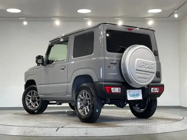 スズキ ジムニー XC 愛知県 2022(令4)年 0.8万km ミディアムグレー ナビ/（Bluetooth/AM/FM/フルセグTV）/衝突軽減ブレーキ/シートヒーター/LEDオートライト/ETC/バックカメラ/純正16インチAW/4WD/シートヒーター/ワンオーナー/クルーズコントロール/ドライブレコーダー/ロッドホルダー/背面タイヤカバー