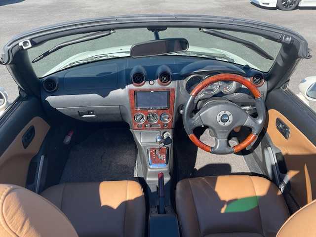 ダイハツ コペン タンレザーエディション 静岡県 2008(平20)年 7万km ホワイトパールマイカ ●社外ナビ/（ワンセグ/CD/DVD）/(NR-MZ03)/●アクティブトップ/●フォグランプ/●ウッドコンビステアリング/●ETC/●運転席＆助手席シートヒーター/●clarionスピーカー/●シガーライター/●純正フロアマット/●純正15インチアルミホイール