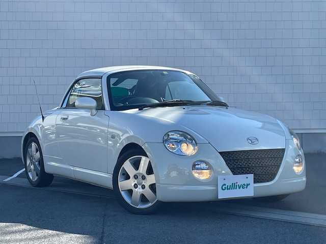 ダイハツ コペン タンレザーエディション 静岡県 2008(平20)年 7万km ホワイトパールマイカ ●社外ナビ/（ワンセグ/CD/DVD）/(NR-MZ03)/●アクティブトップ/●フォグランプ/●ウッドコンビステアリング/●ETC/●運転席＆助手席シートヒーター/●clarionスピーカー/●シガーライター/●純正フロアマット/●純正15インチアルミホイール