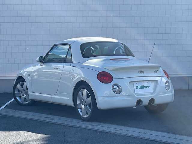 ダイハツ コペン タンレザーエディション 静岡県 2008(平20)年 7万km ホワイトパールマイカ ●社外ナビ/（ワンセグ/CD/DVD）/(NR-MZ03)/●アクティブトップ/●フォグランプ/●ウッドコンビステアリング/●ETC/●運転席＆助手席シートヒーター/●clarionスピーカー/●シガーライター/●純正フロアマット/●純正15インチアルミホイール