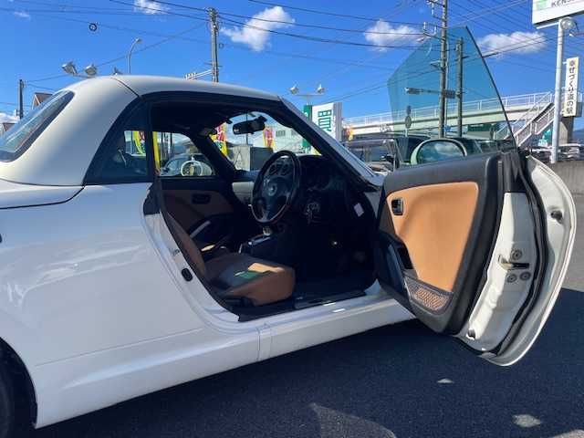 ダイハツ コペン タンレザーエディション 静岡県 2008(平20)年 7万km ホワイトパールマイカ ●社外ナビ/（ワンセグ/CD/DVD）/(NR-MZ03)/●アクティブトップ/●フォグランプ/●ウッドコンビステアリング/●ETC/●運転席＆助手席シートヒーター/●clarionスピーカー/●シガーライター/●純正フロアマット/●純正15インチアルミホイール