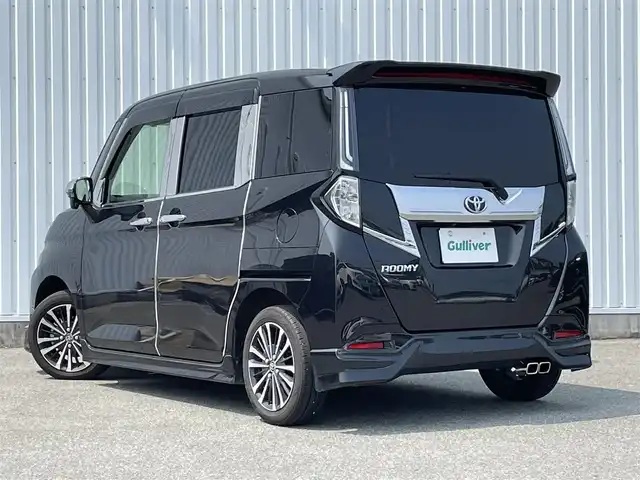 トヨタ ルーミー カスタムG－T 福岡県 2024(令6)年 0.8万km ブラックマイカメタリック モデリスタエアロ/スマートアシスト搭載/レーンキープアシスト/純正9インチディスプレイオーディオ/（BT/USB/FM/AM/AppleCarplay/AndroidAuto）/全周囲カメラ/ビルトインETC２．０/ステアリングスイッチ/ドライブレコーダー前後/社外デジタルインナーミラー/両側パワースライドドア/電動パーキングブレーキ/コーナーセンサー前後/純正フロアマット/純正アルミホイール/LEDライト/プッシュスタート/スマートキー/取扱説明書