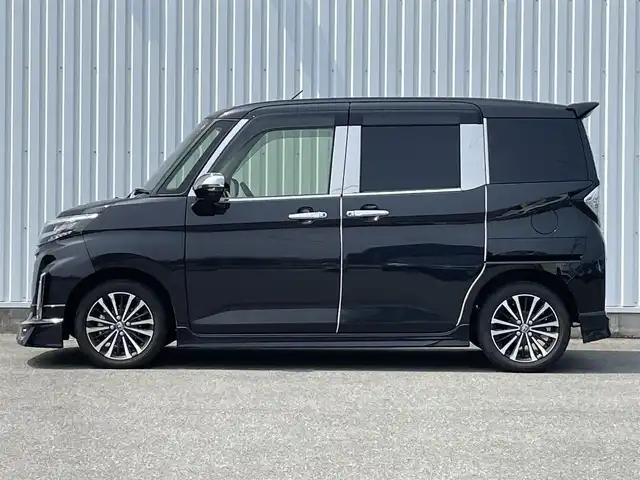 トヨタ ルーミー カスタムG－T 福岡県 2024(令6)年 0.8万km ブラックマイカメタリック モデリスタエアロ/スマートアシスト搭載/レーンキープアシスト/純正9インチディスプレイオーディオ/（BT/USB/FM/AM/AppleCarplay/AndroidAuto）/全周囲カメラ/ビルトインETC２．０/ステアリングスイッチ/ドライブレコーダー前後/社外デジタルインナーミラー/両側パワースライドドア/電動パーキングブレーキ/コーナーセンサー前後/純正フロアマット/純正アルミホイール/LEDライト/プッシュスタート/スマートキー/取扱説明書