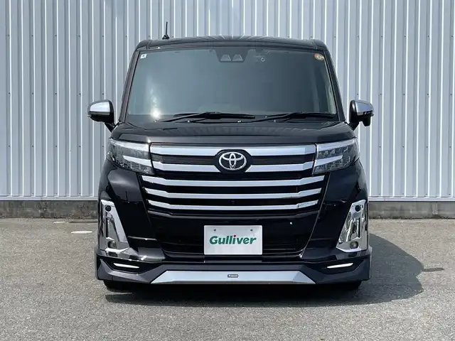 トヨタ ルーミー カスタムG－T 福岡県 2024(令6)年 0.8万km ブラックマイカメタリック モデリスタエアロ/スマートアシスト搭載/レーンキープアシスト/純正9インチディスプレイオーディオ/（BT/USB/FM/AM/AppleCarplay/AndroidAuto）/全周囲カメラ/ビルトインETC２．０/ステアリングスイッチ/ドライブレコーダー前後/社外デジタルインナーミラー/両側パワースライドドア/電動パーキングブレーキ/コーナーセンサー前後/純正フロアマット/純正アルミホイール/LEDライト/プッシュスタート/スマートキー/取扱説明書