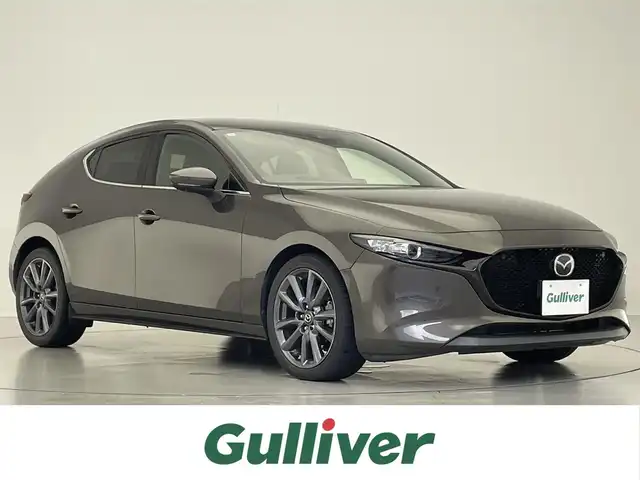 マツダ マツダ３ファストバック 15S ツーリング 滋賀県 2019(令1)年 4.1万km チタニウムフラッシュマイカ 禁煙車/マツダコネクトナビ/・CD/DVD/HDMI/Bluetooth/フルセグ/AUX/LEDヘッドライト/ヘッドライトディスプレイ/360度セーフティパッケージ/オートマチックハイビーム/パーキングオートホールド/革巻きステアリング/ドライブレコーダー/追従クルーズコントロール/純正１８AW/電動格納ウィンカーミラー/スマートキー/プッシュスタート