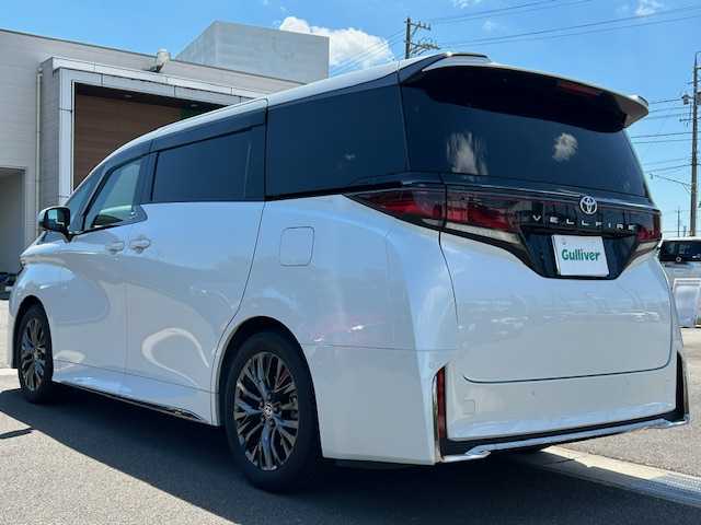 トヨタ ヴェルファイア Z プレミア 静岡県 2024(令6)年 2.1万km プラチナホワイトパールマイカ ワンオーナー/メーカー純正ディスプレイオーディオ＋ナビ/(フルセグ.Bluetooth.ミラキャスト)/左右独立ムーンルーフ/トヨタチームメイト/トヨタセーフティセンス/・プリクラッシュセーフティ/・レーダークルーズコントロール/・レーンキープアシスト/・オートマチックハイビーム/ヘッドアップディスプレイ/アドバンストパークスイッチ/バックカメラ/ブラインドスポットモニター/LEDオートライト/フォグ.リアフォグランプ/ヘッドアップディスプレイ/パドルシフト/茶革レザーシート/ビルトイン2.0ETC/1.2列目パワーシート・ベンチレーション/シートメモリ/両側パワースライドドア/前後ドライブレコーダー/パワーバックドア/デジタルインナーミラー/置くだけ充電器/スペアキー１/保障証/取扱説明書