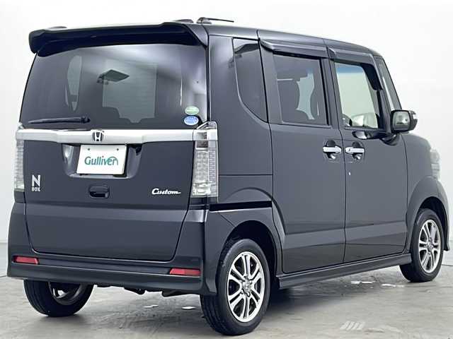 ホンダ Ｎ ＢＯＸ カスタム G Lパッケージ 道央・札幌 2015(平27)年 6.3万km スマートブラック ・4WD/・社外ナビ&DVD&CD&SD&BT&フルセグ/・左側パワースライドドア/・ETC/・社外前方ドライブレコーダー/・前席シートヒーター/・ドアミラーヒーター/・ステアリングスイッチ/・横滑り防止/・プッシュスタート/・HIDヘッドライト/・オートライト/・社外AW冬タイヤ積込