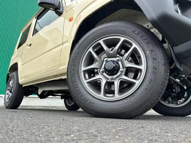 スズキ ジムニー XC 宮城県 2025(令7)年 0.2万km シフォンアイボリーM オプションフロントグリル純正フロントグリル車載/セーフティサポート/・デュアルセンサーブレーキサポート/・車線逸脱警報機能/・ふらつき警報機能/・先行車発進お知らせ機能/・標識認識機能/・ハイビームアシスト/リアパーキングセンサー/社外HDDナビ（CN-H510WD）/・CD/DVD/・Bluetooth/バックカメラ/ビルトインETC/ドライブレコーダー/シートヒーター/革巻きステアリング/クルーズコントロール/LEDヘッドライト/フォグランプ/オートライト/スマートキー＆プッシュスタート/電動格納ミラー/純正16インチAW/純正フロアマット/純正ドアバイザー/W/サイド/カーテンエアバッグ