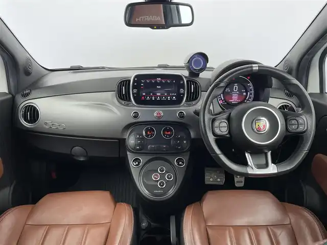 アバルト ５９５Ｃ ツーリズモ 大分県 2020(令2)年 6.9万km パール 1オーナー/電動オープン/純正オーディオ/(BT対応、USB、AM/FM)/キーレス/茶革シート/ETC/パドルシフト/純正フロアマット/HIDヘッドライト/純正17インチアルミホイール/Rコーナーセンサー/保証書、取説
