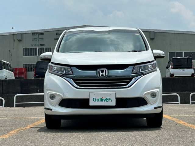 ホンダ フリード ハイブリット G ホンダセンシング 秋田県 2017(平29)年 6.5万km ホワイトオーキッドパール ４WD/両側パワースライドドア/純正ナビ/ETC/横滑り防止装置/衝突被害軽減システム/レーダークルーズコントロール/ECON/LEDライト/フォグランプ/オートライト/前席シートヒーター/社外アルミホイール