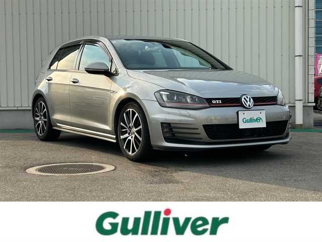 フォルクスワーゲン ゴルフ ＧＴＩ 富山県 2014(平26)年 6.9万km タングステンシルバーメタリック 純正17インチAW/アダプティブクルーズコントロール/プリクラッシュブレーキシステム/ブラインドスポットディテクション/レーンキープアシスト/プロアクティブオキュパントプロテクション/パーク・ディスタンス・コントロール(PDC)/リアトラフィックアラート/パドルシフト/ウィンカーミラー/ETC/プッシュスタート/スマートキー/HIDヘッドランプ/LEDフロントフォグランプ/クロームツインマフラーカッター/革巻きステアリングホイール/ステアリングスイッチ/シートアンダートレイ